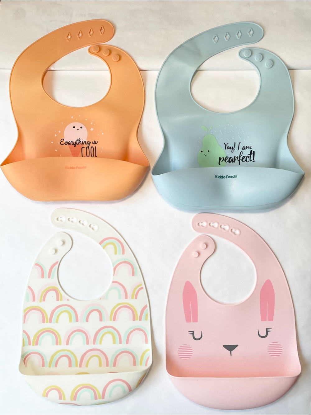 Four (4) Silicone Baby and Toddler Bibs